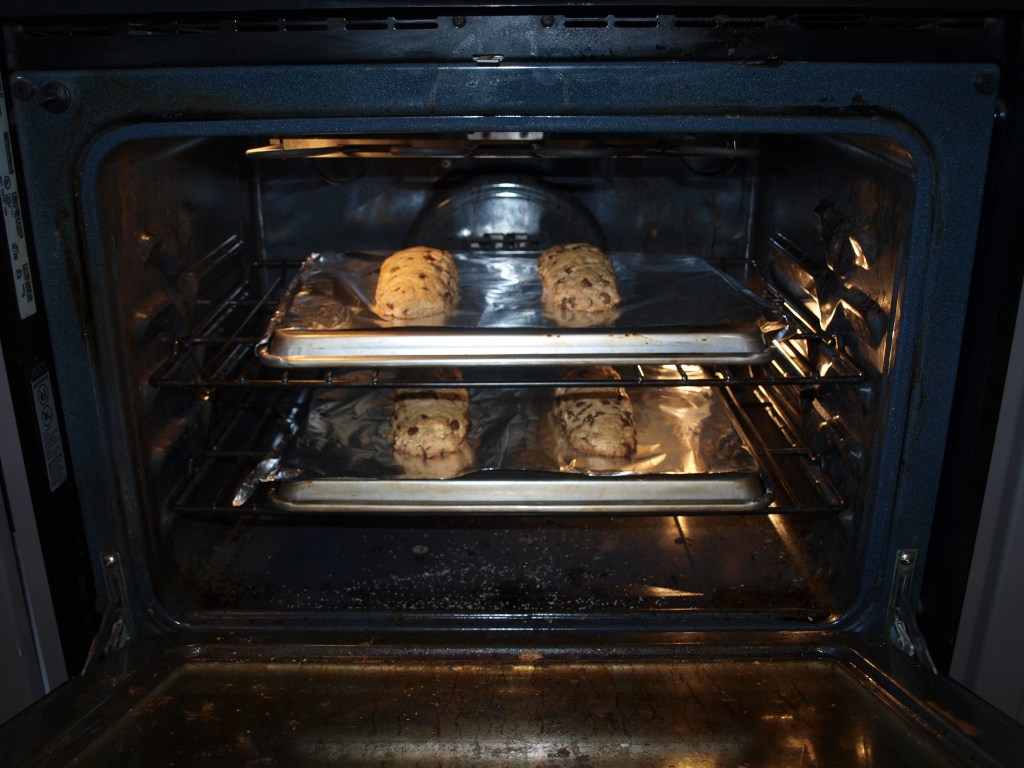 The biscotti dough should be evenly spaced in the oven.